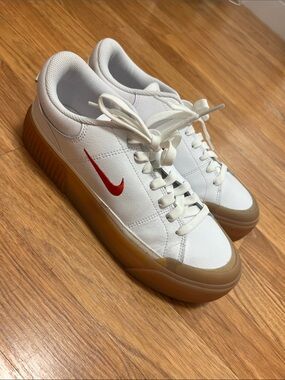 Nike White Leather Sneakers with Red Swoosh and Gum Sole
